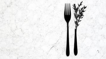 Black Table Fork and Plant photo