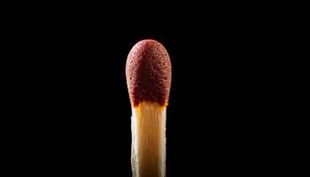Close-up of a Matchstick Head Igniting Against a Dark Background, Highlighting the Spark of Potential Energy in Everyday Objects photo