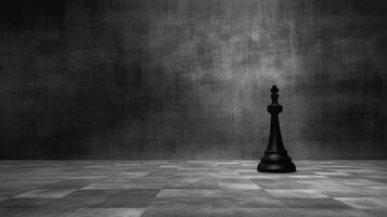 Black chess king on dark background photo