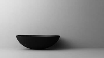 Black Bowl on Grey Surface photo
