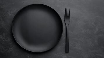 Plate and fork, table setting top view photo
