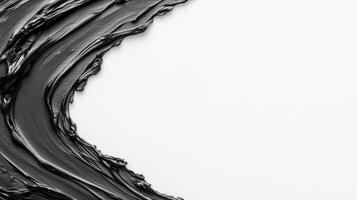 Textured Black Cosmetic Cream Swirl on White photo