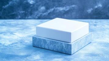 Square white box on square stand photo
