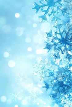 Blue snowflakes on light bokeh backdrop photo