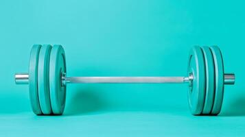 Blue barbell on a blue background photo