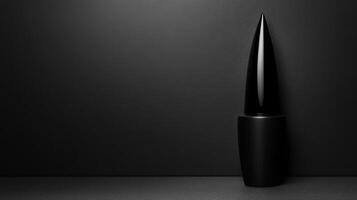 Black Nail Polish Bottle on Dark photo
