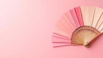 Pink Paper Fan on Pink Surface photo