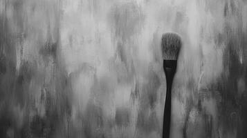 Paint brush on painted surface photo