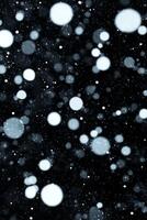 Abstract white circles dark background photo