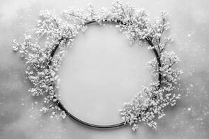 Elegant Monochrome Wreath with White Floral Elements on Grey photo
