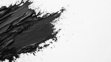 Bold Black Smear Stretches Across a Clean White Canvas photo