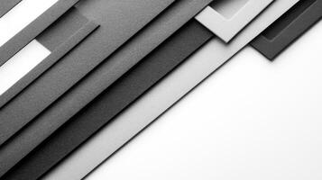 Layered Geometric Shapes in Monochrome Tones on a Clean White Background photo