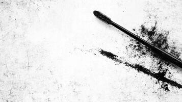 Mascara brush close up on a white background cosmetic product for eyelashes photo