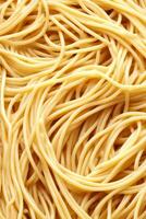 A Close Up View of Cooked Spaghetti Noodles photo