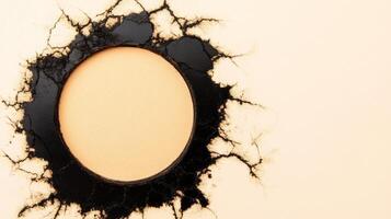 Charred Ring with Cracks on a Beige Background photo