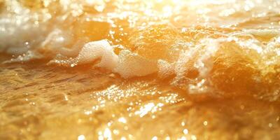 Golden waves gently crash on the shore, reflecting sunlight and creating a serene atmosphere. photo