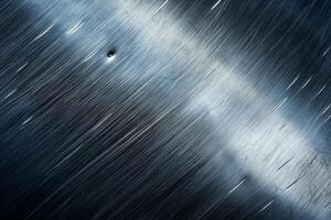 Abstract close-up of brushed metal surface showcasing dynamic textures and light reflections. photo