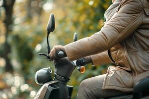 A stylish woman in a brown quilted jacket enjoys a ride on a scooter amidst a scenic autumn backdrop. photo