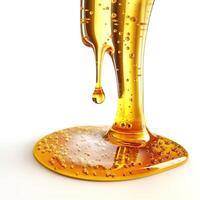 Golden honey dripping gracefully, creating a mesmerizing effect against a white background. photo