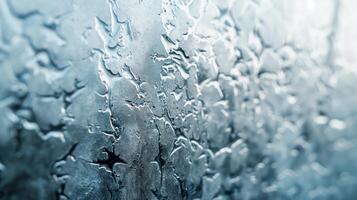 Close-up of textured water droplets creating a mesmerizing pattern on glass. photo