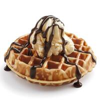 Delicious waffle topped with creamy vanilla ice cream and drizzled with rich chocolate sauce. photo