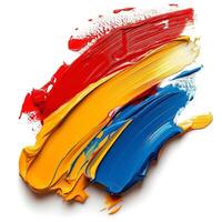 Vibrant strokes of red, yellow, and blue acrylic paint create an expressive and lively texture. photo