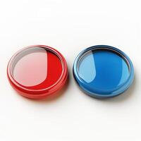 Two glossy circular buttons in vibrant red and blue colors on a light surface. photo
