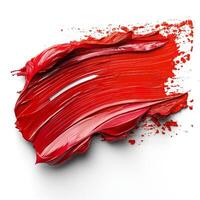 Vibrant red paint smear on a white background, showcasing a rich texture and bold color. photo
