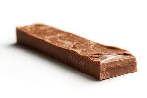 Close-up of a smooth chocolate bar with a glossy finish, showcasing its rich, creamy texture. photo