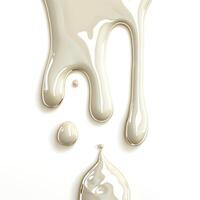 Elegant beige paint dripping gently against a white background, creating a smooth and glossy texture. photo