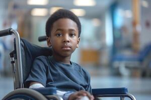 A thoughtful Black boy in a wheelchair, gazing into the distance in a calm hospital environment. photo