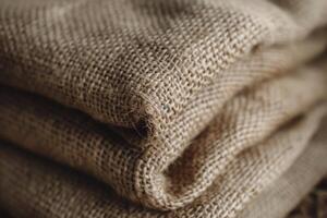 Close-up of textured burlap fabric with a natural, rustic aesthetic. photo