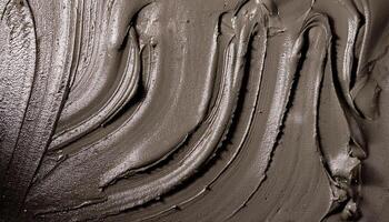 Rich Grey Clay Being Mixed to Create a Smooth and Even Texture for Pottery Making in a Creative Studio photo