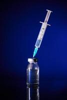 Injection with vaccine for COVID19 in studio photo
