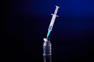Injection with vaccine for COVID test in studio photo