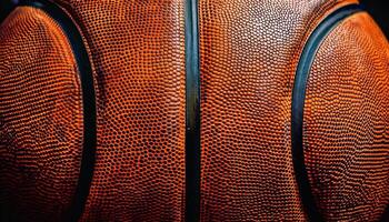 Close up of a Textured Basketball Highlighting Its Intricate Surface Detail and Design During a Game in an Indoor Court photo
