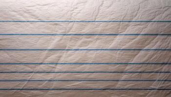 Crumpled Lined Paper on a Wooden Surface With Blue Lines and a Textured Appearance photo