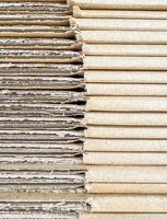 Stacked Corrugated Cardboard Sheets Showing Rough and Smooth Edges in Detail. High quality photo