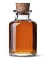 A bottle of maple syrup with cork on a white background photo