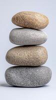 A stack of stones on a white background photo