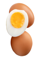 Raw brown chicken eggs and cooked or boiled chicken egg with egg yolk in half in stack isolated with clipping path in file format png