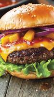 A delicious burger with a juicy beef patty, melted cheese and fresh lettuce. Yellow mango pickle adds unique flavor photo