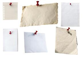 A collection of white note sheets isolated on a white background. photo