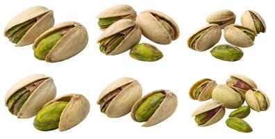 Set of pistachio nuts on white background photo