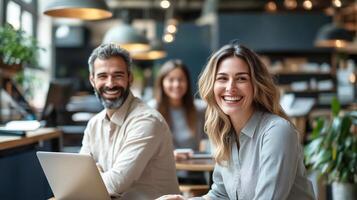 Smiling business professionals collaborating in a modern office, fostering teamwork, productivity, and workplace success. photo