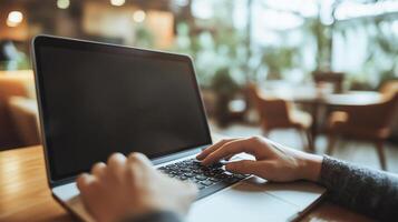 A person using a laptop in a cafe faces a No Internet connection error, highlighting WiFi issues and connectivity problems. photo
