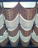 A large number of white and brown paper bags photo