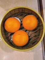 A bowl of oranges photo