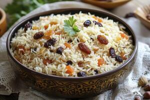 Rice Pilaf with Dried Fruits in Bowl Close-up, Healthy Food photo
