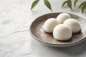 Mochi Dessert on Plate with Sauce Simple Elegant Food Photography photo